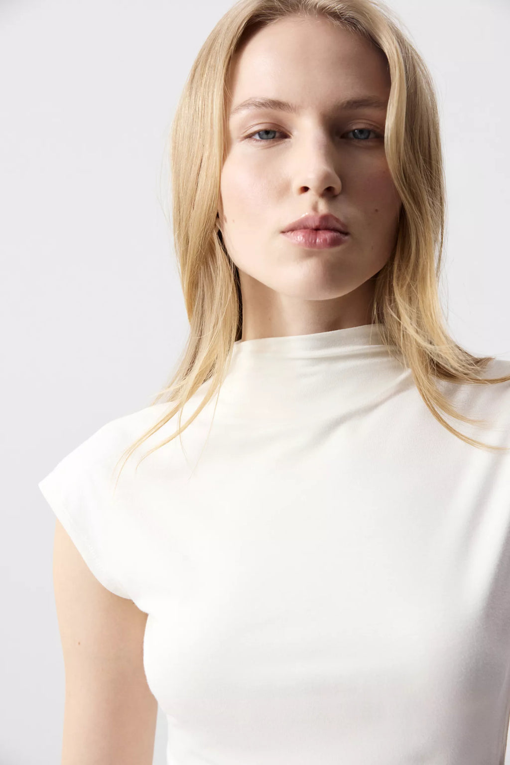 High-neck knitted blouse